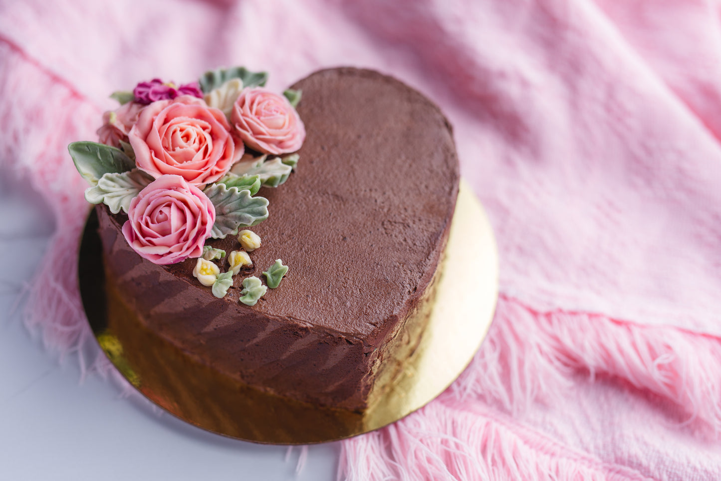 Heart Shaped Chocolate cake with piped flowers